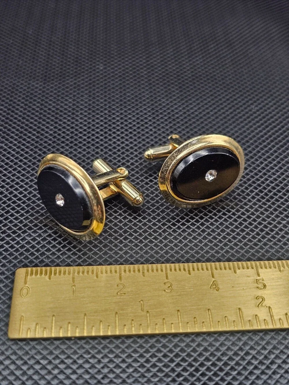 Vintage Gold Tone Black Oval Cufflinks with Clear Stone Accent